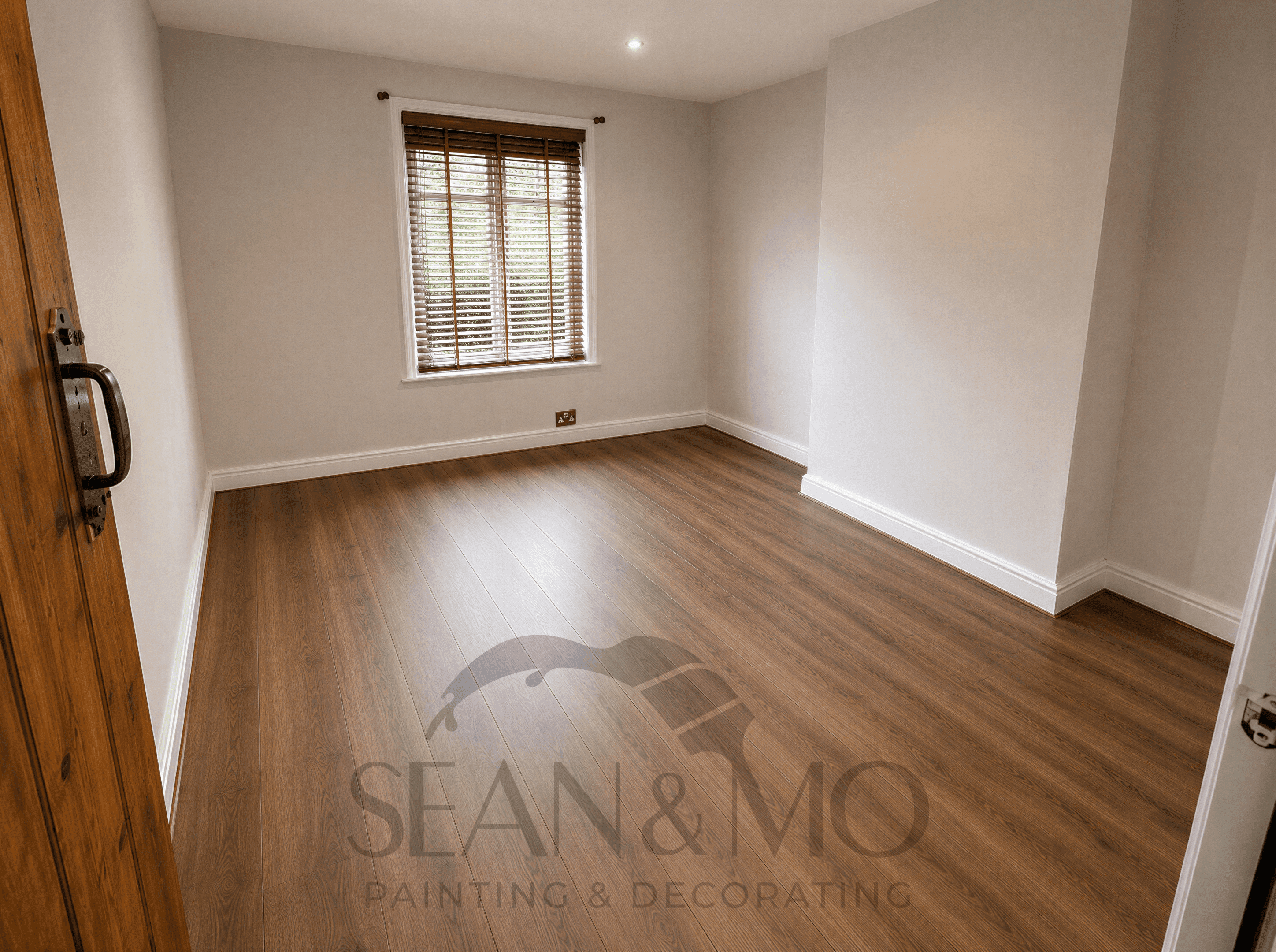 Room refresh with new flooring and painted walls